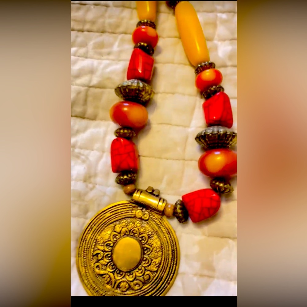 Necklace husband d bought me in Africa. Beautiful real stones.